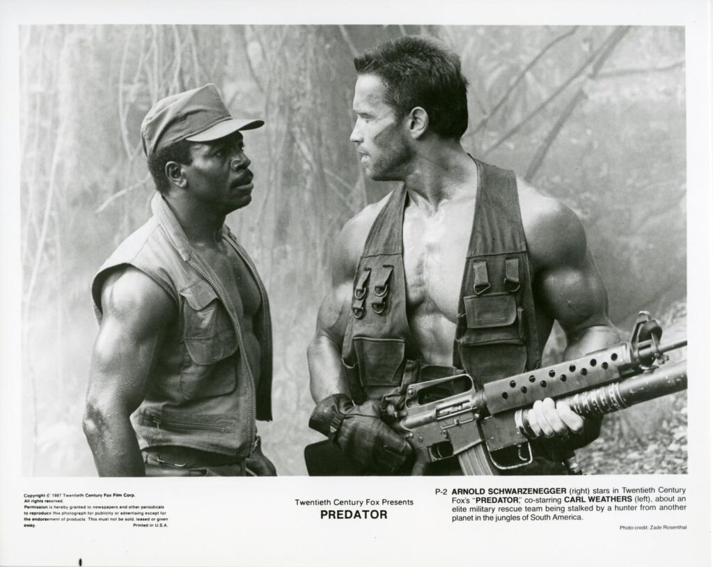 Carl Weathers and Arnold Schwarzenegger in Predator - Kombatnet
