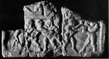 Placca di terracotta di lottatori e pugili - Periodo protodinastico - Iraq Baghdad - Kombatnet Wiki